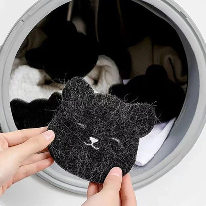 Pet Corner reusable pet hair remover in action, showing its washable design on a laundry surface with pet hair.